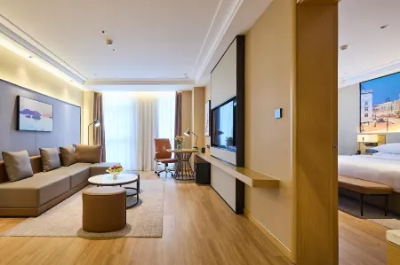 Vienna International Hotel (Tangshan Laoting Jingtanggang Branch）) Отели рядом с достопримечательностью «Li Dazhao Memorial Hall (South Gate)»