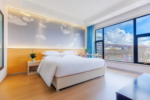 Rishi Xuriling Resort Hotel (Ganzhi County Baita Park Scenic Area Store) - فطور