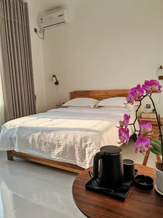 Dingdou Homestay Отели рядом с достопримечательностью «Rhino Land of The Pu'Er National Park»