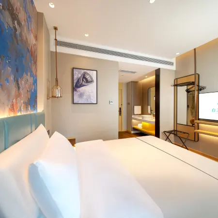 Magnotel Hotel (Liangshan Shuibo East Road Longcheng Plaza)