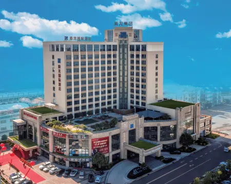 Rising Dragon International Hotel Отели рядом с достопримечательностью «Fuyuan Youye»