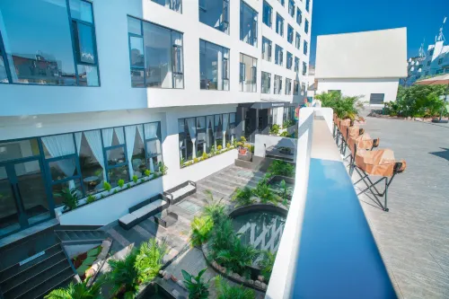 Mile Shanhai Xile Hotel (FoCheng ShangDu Jinxiu Flower Street)