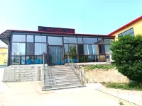 Changhai County Zhangzi Island Maoyuan Fisherman's Homestay - شاطئ