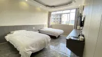 Wanzai Huadu Business Hotel