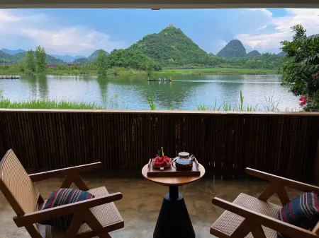 Rizha Baizha Lake View Inn Отели рядом с достопримечательностью «Qiubei Puzhehei Wetland Park»