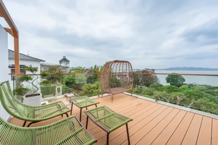 Suzhou Xiyuju Homestay (Taihu Lake Eastern Mountain) Отели рядом с достопримечательностью «Ботанический сад Цзяньнан»