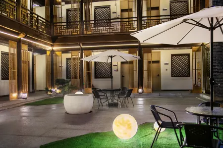 moshang hotel Отели рядом с достопримечательностью «Taierzhuang Ancient Town»