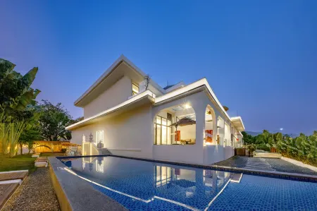 Jiangmu 377 Garden Private Villa Отели рядом с достопримечательностью «Xishuangbanna Folk Custom Garden»