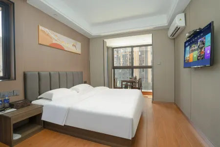 DaTian•ChengJingQingJu|VIGOROUS•SOULMATE Phoenix Business Hotel (KaiYuan TianChe Branch) Отели в г. Датянь