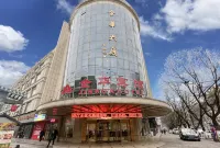 泊森美居酒店（金華大廈店） 鄰近華亭縣體育中心的酒店