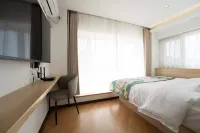 Weihai Jiaqi Hotel (Weihai high speed railway bus terminal store)