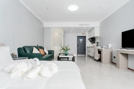 Longkou Jinli Serviced Apartment Hotel (Longhu Tianjie Poly Plaza) Отели рядом с достопримечательностью «Huangcheng Ancient City»