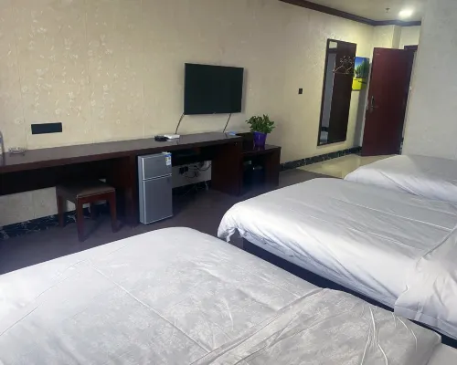 Hua Sheng Hotel Rooms Photos