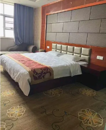 Ducai Grand Hotel (Duchang Station) Отели в г. Доучань