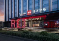 Radisson RED Jilin City Отели в г. 