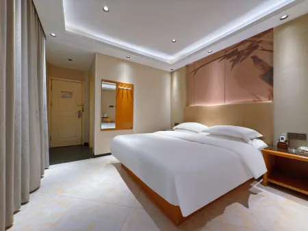 Home Inn Alliance Huayi Hotel (Tancheng Railway Station Tanguo Ancient City) Отели рядом с достопримечательностью «Linyi Radio and TV University Tancheng Branch»