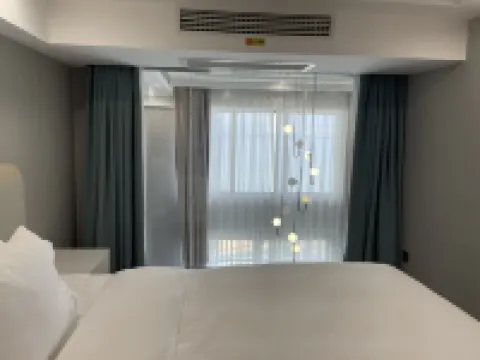 Xiaocheng International Apartment Hotel