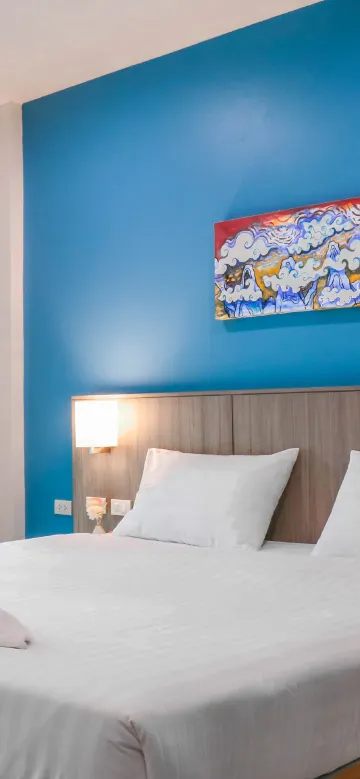 ห้องดีลักซ์ เตียงใหญ่ 1 เตียง