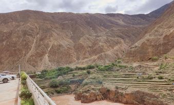 Mangkang Rumei Yijiang Kaiyue Hotel