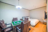 Qunhao Hotel (Guigang Sports Center Store) Hoteller i Gangbei District