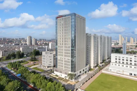 Hampton by Hilton Rongcheng Отели в г. Жунчэн