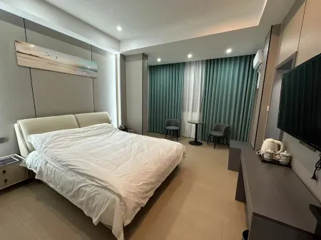 Tongcheng Dongxinjie Homestay Отели в г. Тунчен