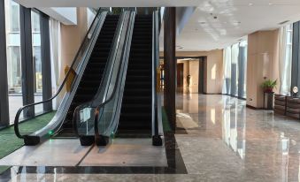 Shanxi International Sports Exchange Center. Hotel MoMc (Red Lantern Stadium)