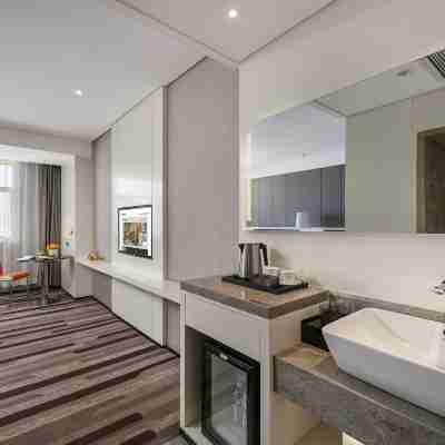 艾尚酒店（庫爾勒交通西路人民廣場店） Rooms