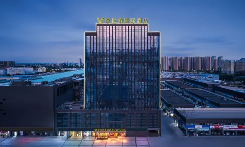 Vienna International Hotel(Zhoukou Wanguo Car World Store)