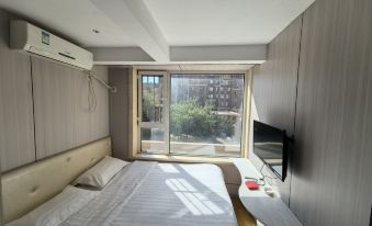 Songyuan Aizhilu Theme Hotel