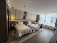 Weiduo Business Hotel Hotel di Anda