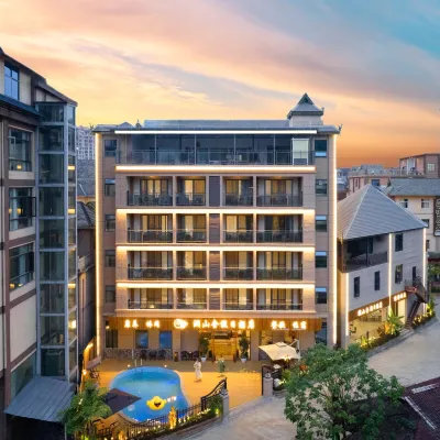 Lanshan She Holiday Hotel (Xishuangbanna Jinghong Menglong Dafosi Manhe Na Scenic Area Branch) Отели рядом с достопримечательностью «Культурный Экспо-Экспонат по Эксперту»