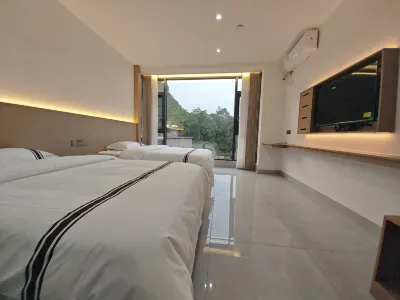 Q Plus Libo Maolan Traveller's Home 리보 호텔