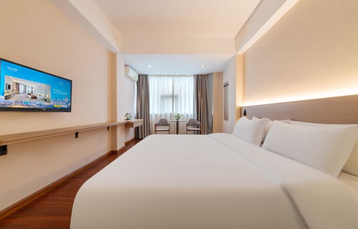 Kana Business Hotel (Zhanjiang Haitian Park Yingzhan Holiday Plaza)