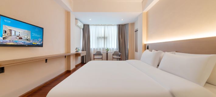 Kana Business Hotel (Zhanjiang Haitian Park Yingzhan Holiday Plaza) Hoteles en Zhanjiang