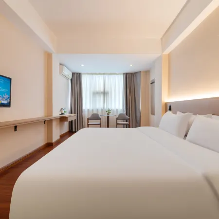 Kana Business Hotel (Zhanjiang Haitian Park Yingzhan Holiday Plaza)