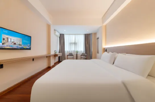 Kana Business Hotel (Zhanjiang Haitian Park Yingzhan Holiday Plaza)