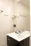 Ratchadamnoen Residence Hotel berhampiran Sekolah Satriwithaya