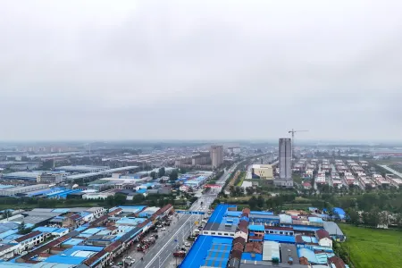 Junyi Chain Hotel (Suqian Sucheng Gengche E-commerce Industrial Park) Отели рядом с достопримечательностью «Suqian Industry Secondary Specialized School»