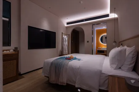 Pinmanchen Hotel (Tongren High speed Railway Station Branch) Отели рядом с достопримечательностью «Ming Paradise»