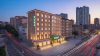 Qingju Hotel (Dalian Railway Station Dongguan Street) Hotel berhampiran Dataran Olimpik Dalian