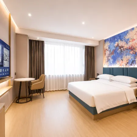 Magnolia Business Hotel (Yantai Longkou Heping Road Branch)