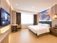 Magnolia Business Hotel (Yantai Longkou Heping Road Branch)