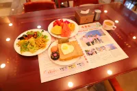 Greentree Eastern Hotel (Linshu Aiqinhai) - sarapan
