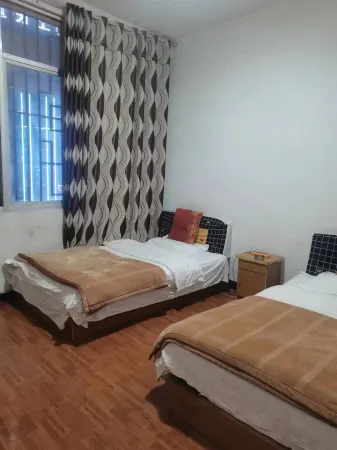 Xiongfulong Hotel Отели рядом с достопримечательностью «Tiankeng Group»