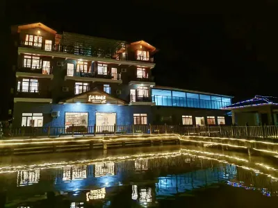 Yunduan Simian Mountain Hotel Отели рядом с достопримечательностью «Взгляд на деревенские водопады»