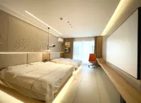 Daqing Intercontinental Smart Apartment (Ranghu Road Wanda Branch) - โฮมสเตย์