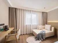 Happy Travel Hotel (Haikou MOVA Commercial square Duty Free) Hotels near Meilan