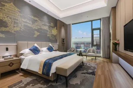 Pu'erzhuang Hotel Отели рядом с достопримечательностью «Daijiaxiang Ancient Buildings»