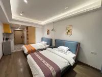 Baishun Chain Hotel Apartment ( Ganzhou Vientiane SOHO Branch) - Condos